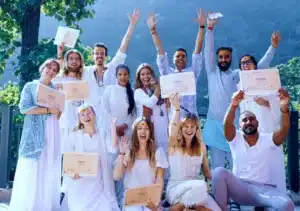 all the yoga students cheering with there Yoga Alliance Certificate by Mind Flow Harmony Yoga Academy